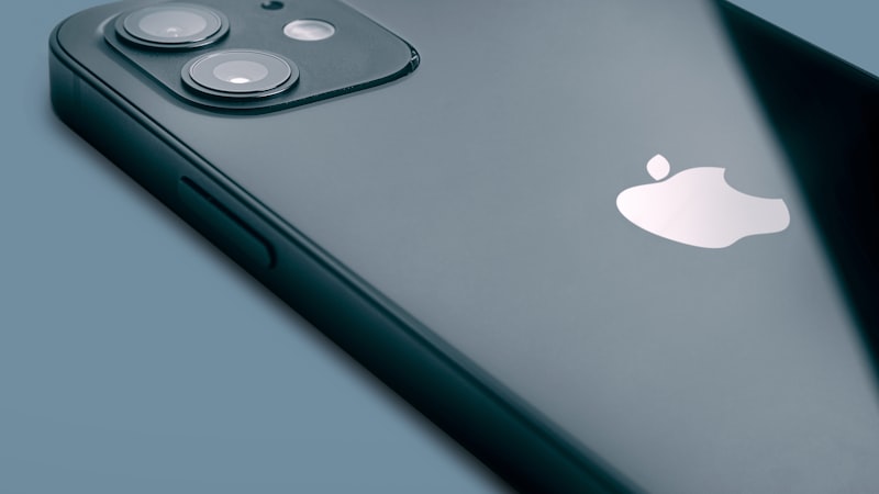 iPhone close-up showing Apple logo and camera